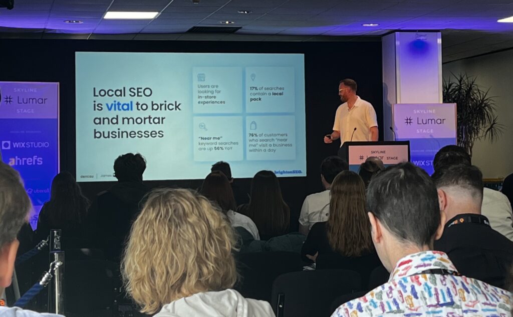 James Foley, SEO Director at dentsu, presenting on how to create the perfect local SEO webpage at BrightonSEO 2024.